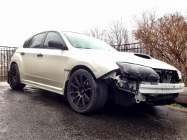 2011 Subaru Impreza WRX with 18x9 Rota G-Force wheels