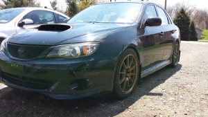 2010 Subaru Impreza with 18x8.5 Rota SS10 Sport wheels
