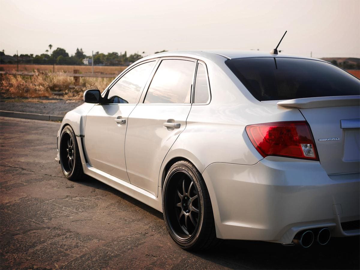 2014 Subaru Impreza with 18x9.5 Rota P1R wheels