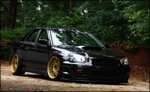 2005 Subaru Impreza with 18x10 Rota SVN wheels