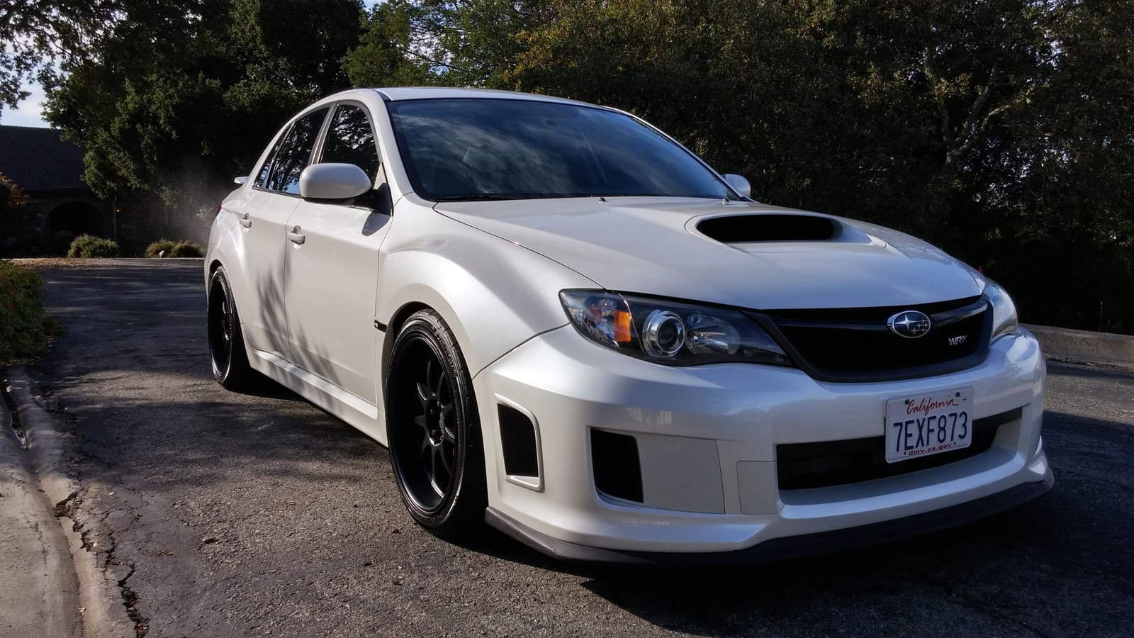 2014 Subaru Impreza WRX with 18x9.5 Rota P1R wheels