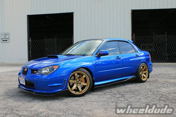 2006 Subaru Impreza WRX with 18x9.5 Rota Grid wheels