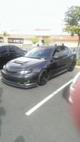 2011 Subaru Impreza WRX with 18x9 Rota G-Force wheels