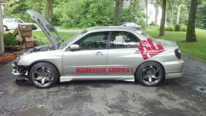 2004 Subaru Impreza WRX with 18x9.5 Rota wheels