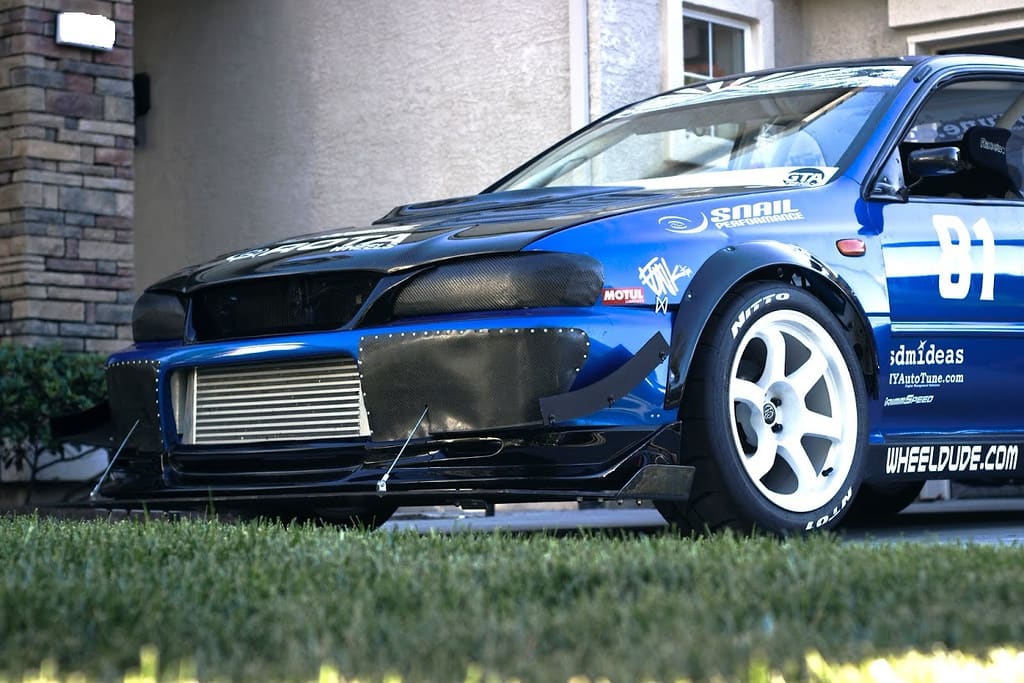 2000 Subaru Impreza with 17x9.5 Rota Grid wheels