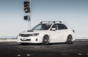 2013 Subaru Impreza WRX with 18x9.5 Rota Torque wheels