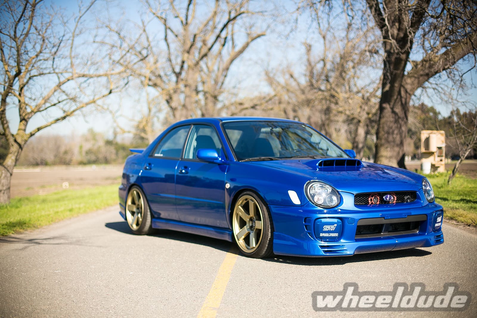 2002 Subaru Impreza WRX with 18x9.5 Rota HG5 wheels