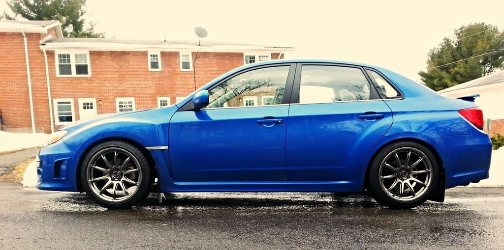2014 Subaru Impreza WRX with 18x9.5 Rota T2R wheels