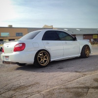 2007 Subaru Impreza with 18x9.5 Rota Boost 2 wheels