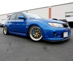 2014 Subaru Impreza WRX with 18x9.5 Rota MXR wheels