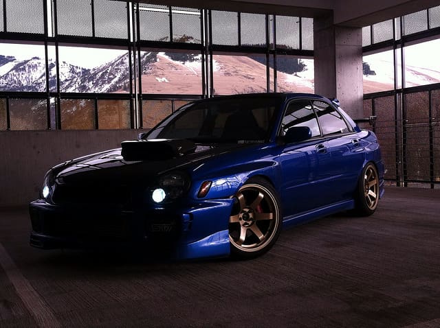 2002 Subaru Impreza WRX with 18x9.5 Rota wheels