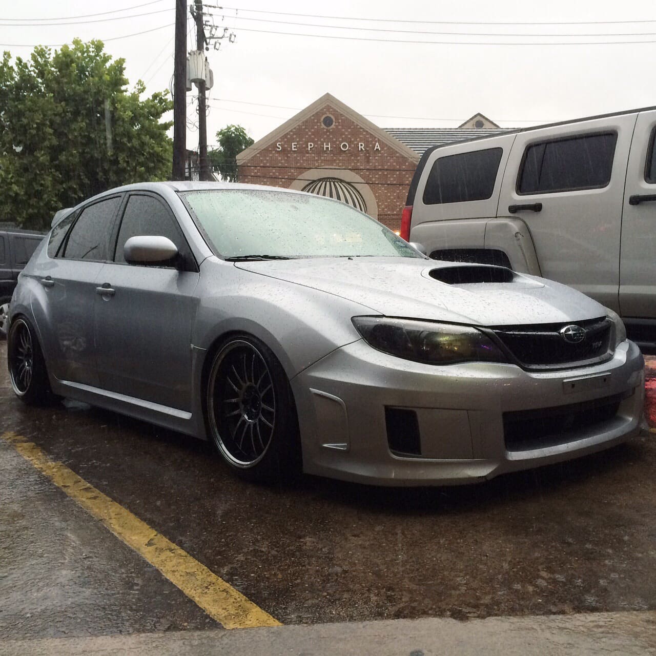 2014 Subaru Impreza WRX with 18x10 Rota SVN wheels