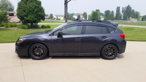 2016 Subaru Impreza with 17x8 Rota G-Force wheels