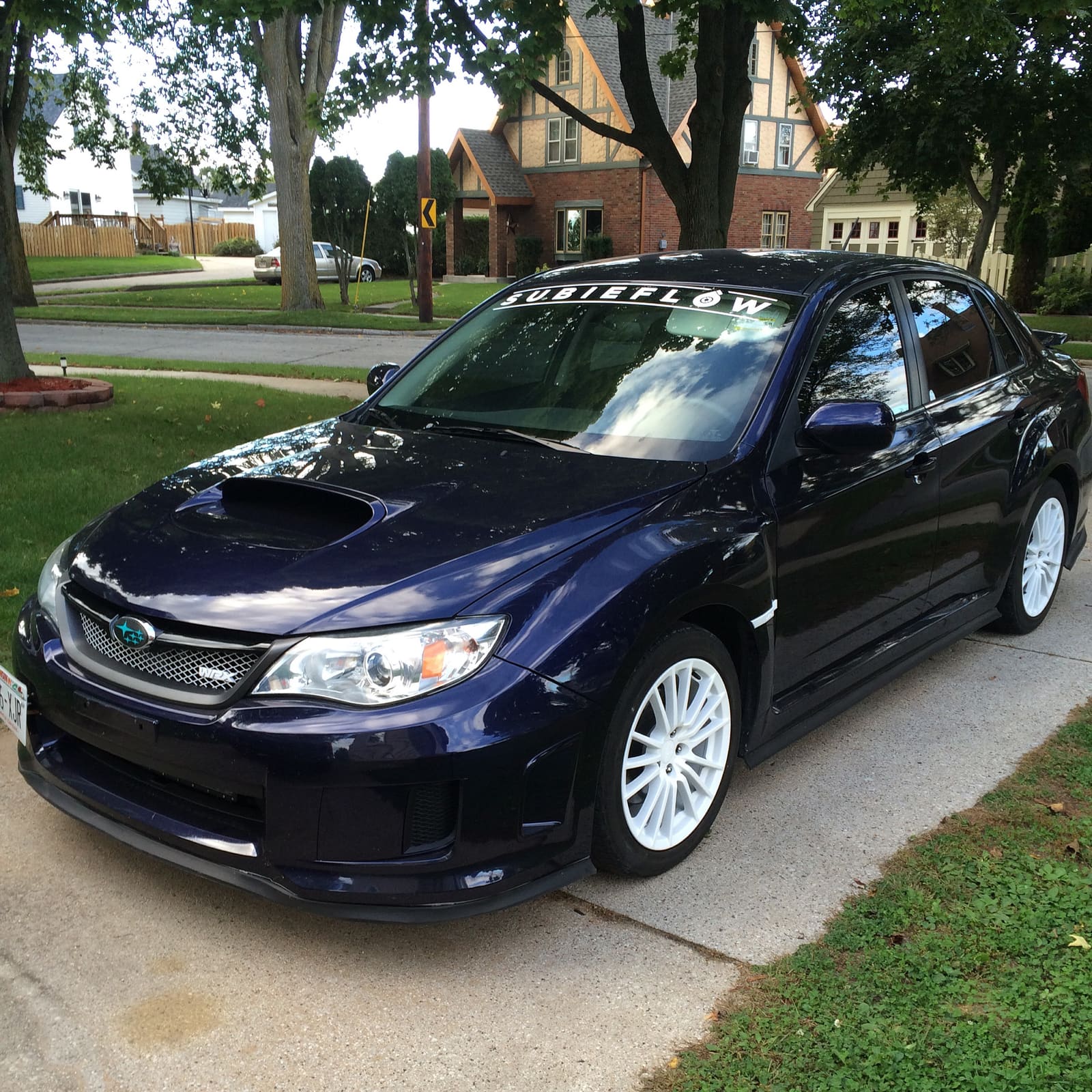 2013 Subaru Impreza WRX with 18x9.5 Rota wheels