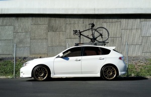2011 Subaru Impreza WRX with 18x8.5 Rota SVN wheels