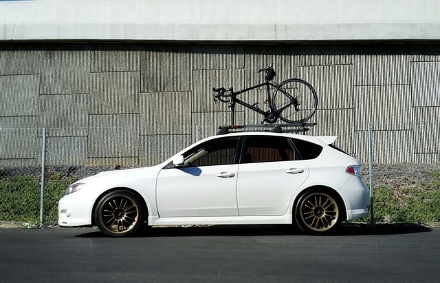 2011 Subaru Impreza WRX with 18x8.5 Rota SVN wheels