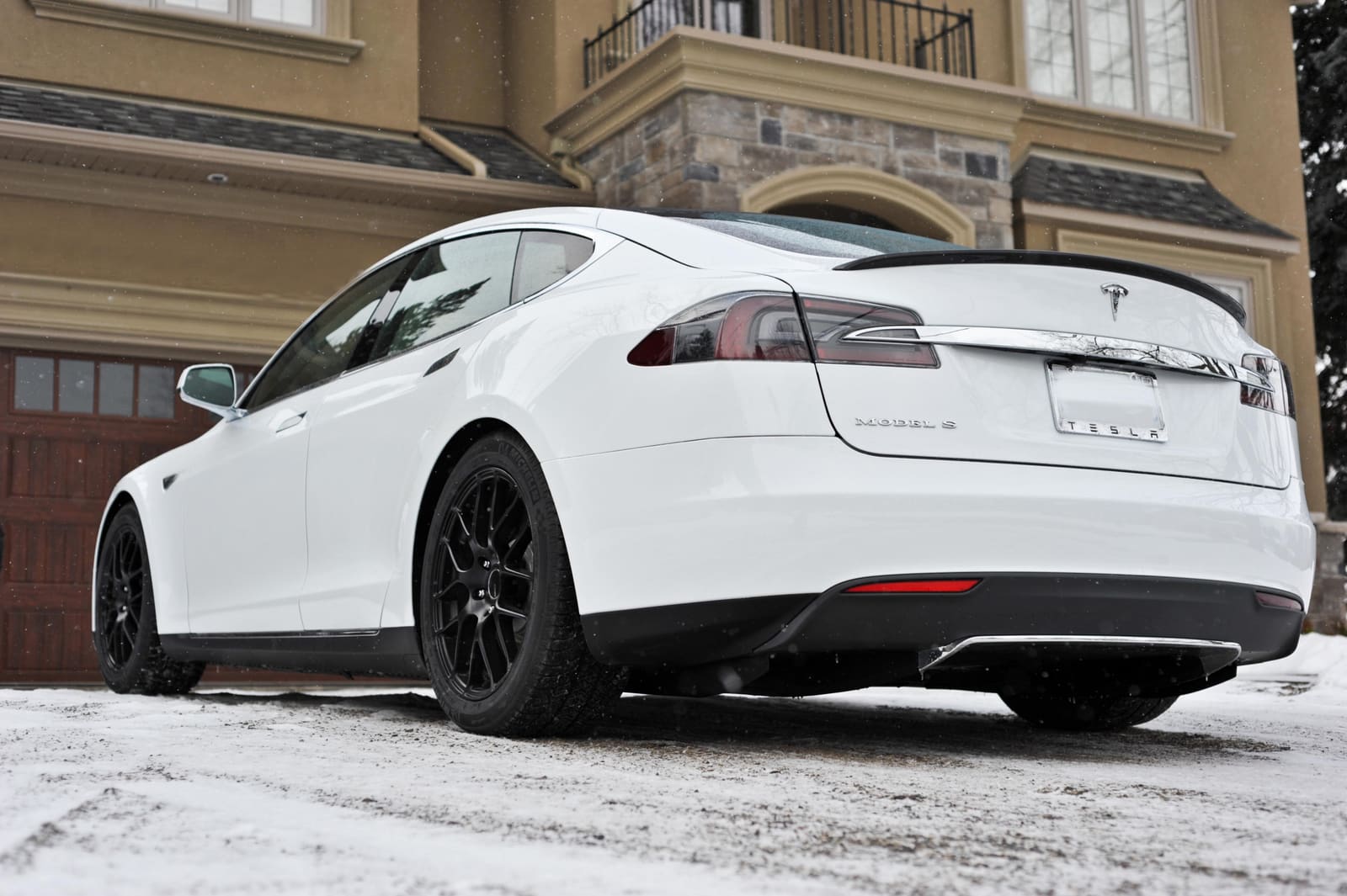 2014 Tesla Model S with 19x8.5 Enkei Raijin wheels
