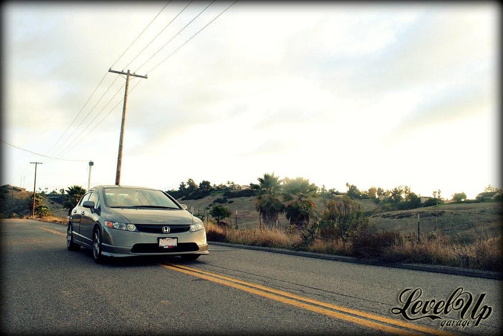 2008 Honda Civic with 17x8 enkei evo 8 wheels