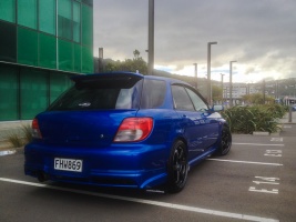 2002 Subaru Impreza WRX with 18x8.5 Rota Grid wheels