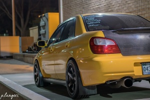 2003 Subaru Impreza with 17x9 Rota RT5 wheels