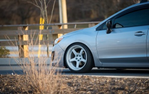 2013 Subaru Impreza with 18x10 Rota RT5 wheels