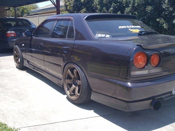 1999 Nissan R31-R34 Skyline 4dr with 18x9.5 Rota Grid wheels