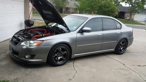 2008 Subaru Legacy with 17x9.5 Rota RT5 wheels