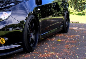 2009 Subaru Impreza with 18x9.5 Rota Boost 2 wheels