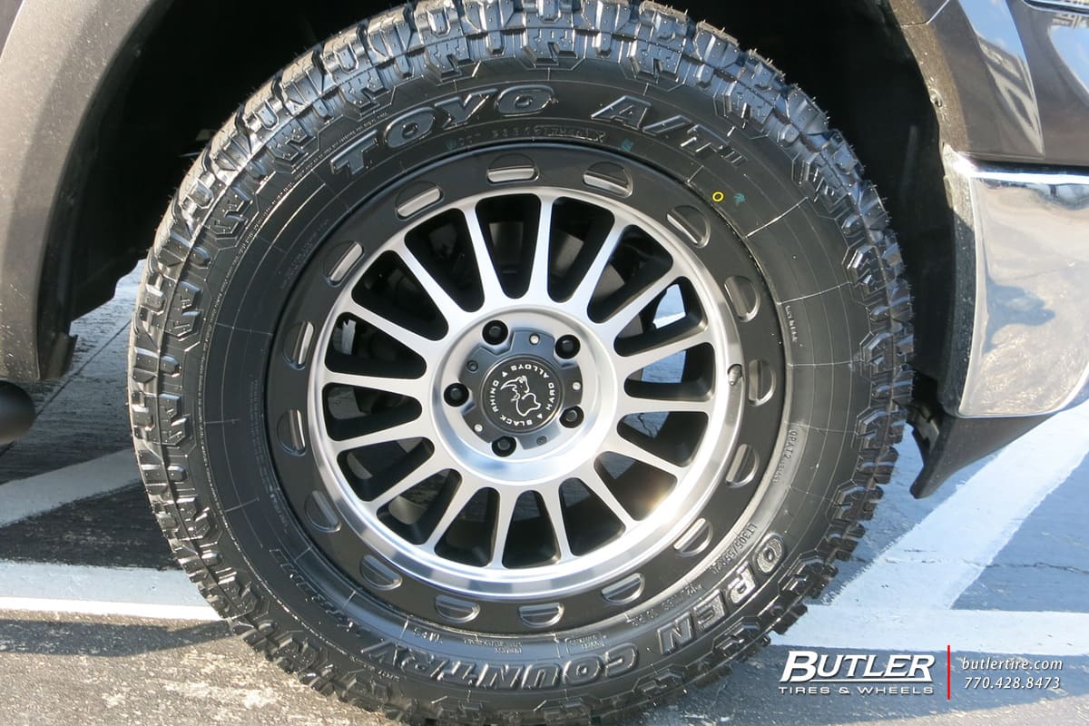 2013 RAM 1500 with Black Rhino Taupo wheels