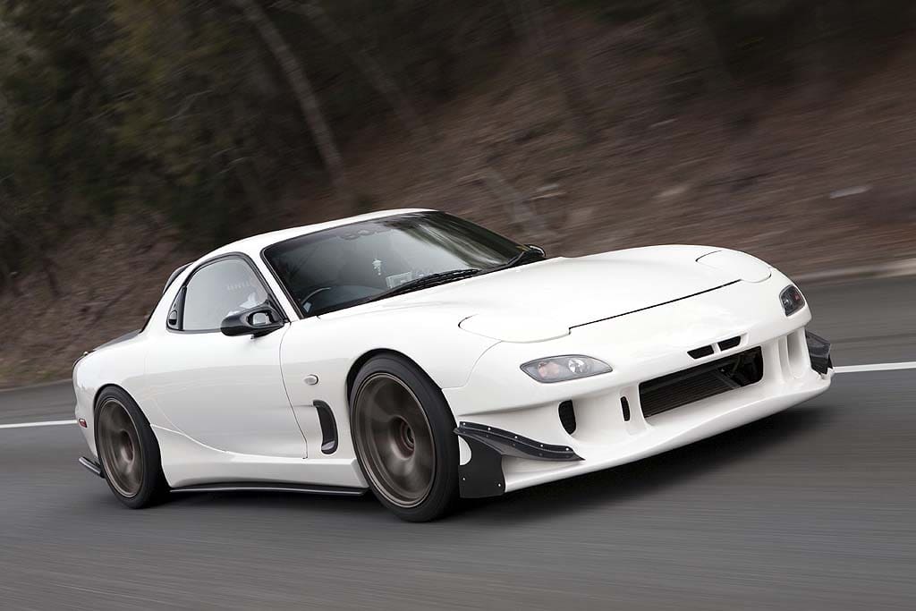 1999 Mazda RX-7 with 18x9.5 Work Emotion XT7 wheels