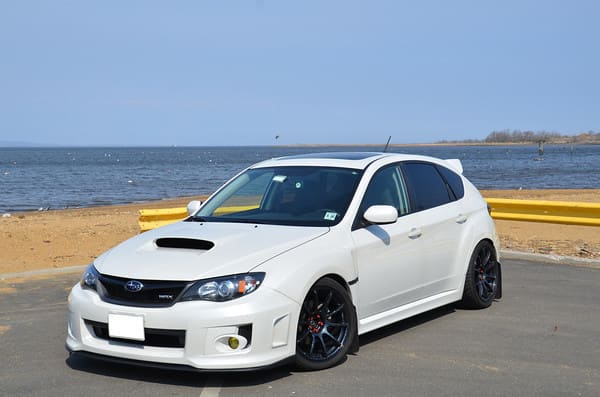 2011 Subaru Impreza WRX with 18x9 Rota G-Force wheels