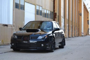 2007 Subaru Impreza WRX with 18x9.5 Rota Grid wheels