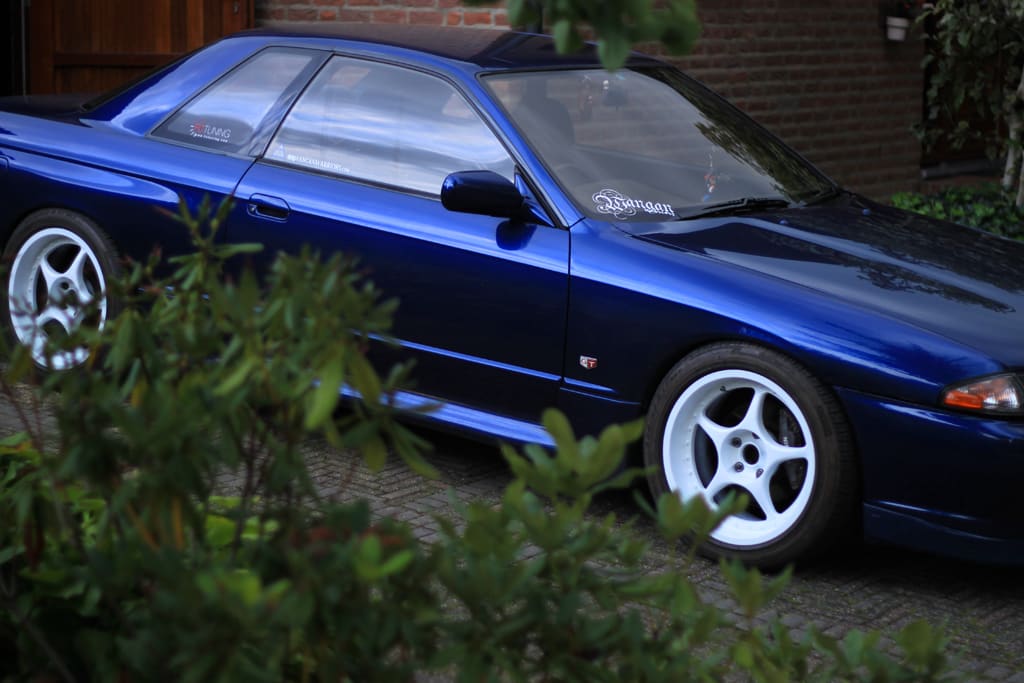 1992 Nissan R31-R34 Skyline 2dr with 17x9 Enkei wheels