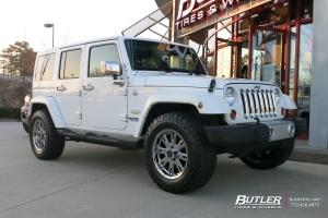 2012 Jeep Wrangler Unlimited with American Racing AR708 wheels