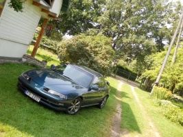 1996 Honda Prelude with 16x7 Kosei Prauzer wheels