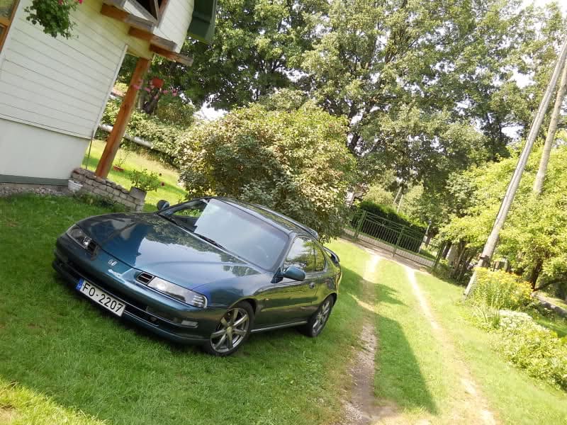 1996 Honda Prelude with 16x7 Kosei Prauzer wheels