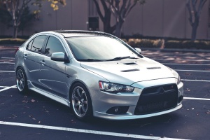2010 Mitsubishi Lancer Sportback with 18x8.5 Rays Gram Lights 57S-PRO wheels