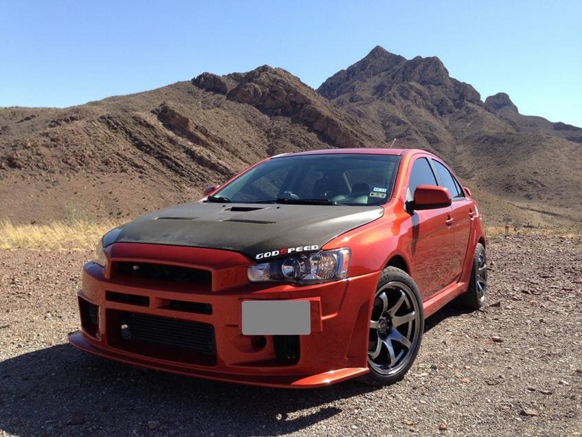 2009 Mitsubishi Lancer with 18x9.5 XXR 522 wheels