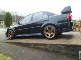 2005 Mitsubishi Lancer Evolution with 17x9 Rota GTR wheels