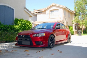 2010 Mitsubishi Lancer Evolution with 18x9.5 Rota Grid wheels