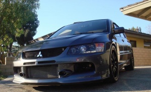 2003 Mitsubishi Lancer Evolution with 18x9 Volk Racing CE28N wheels