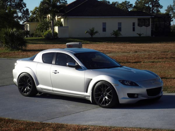 2004 Mazda RX-8 with 19x8.5 Linea Corse LC 818 wheels