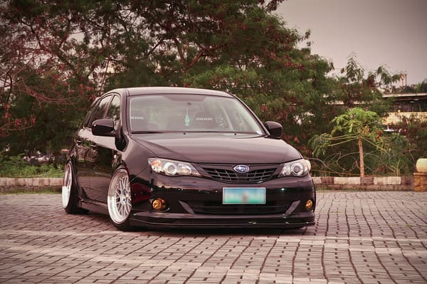 2013 Subaru Impreza with 18x9.5 Linea Corse LeMan wheels