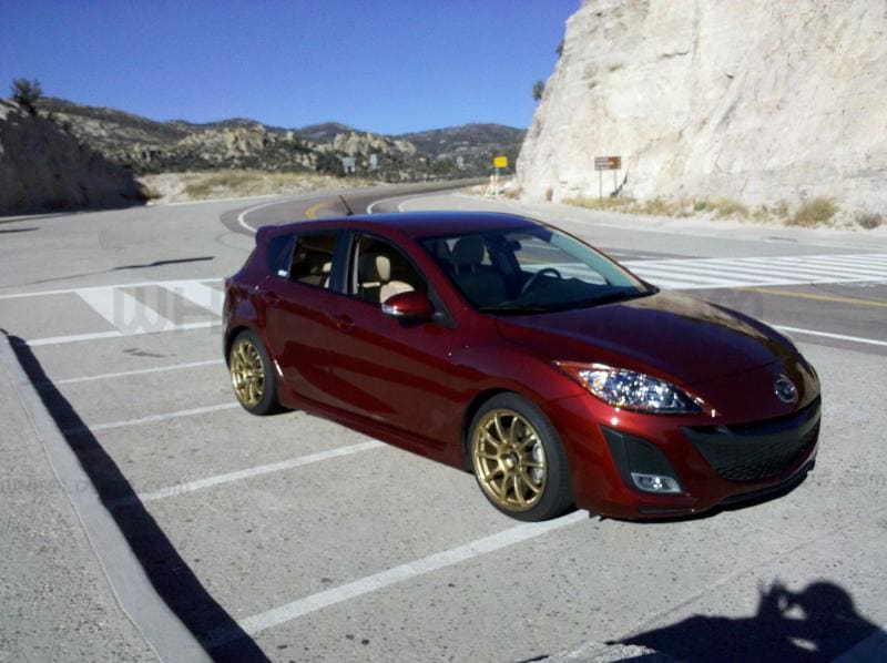 2009 Mazda Mazda3 with 18x8.5 Rota G-Force wheels