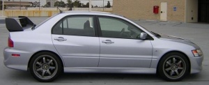 2008 Mitsubishi Lancer Evolution with 18x8.5 Gram Lights 57S wheels