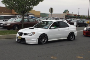 2006 Subaru Impreza WRX STi with 18x9.5 rota torque wheels