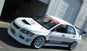 2008 Mitsubishi Lancer Evolution with 18x9.5 Gram Lights Optimize Wheels wheels