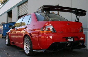 2008 Mitsubishi Lancer Evolution with 18x9.5 Enkei NT03M wheels
