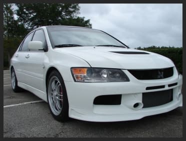 2005 Mitsubishi Lancer Evolution with 17x8.5 Enkei RPF1 wheels
