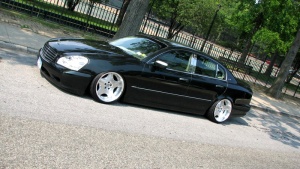 2002 Infiniti Q45 with 19x11.5 Auto Couture Supreme wheels